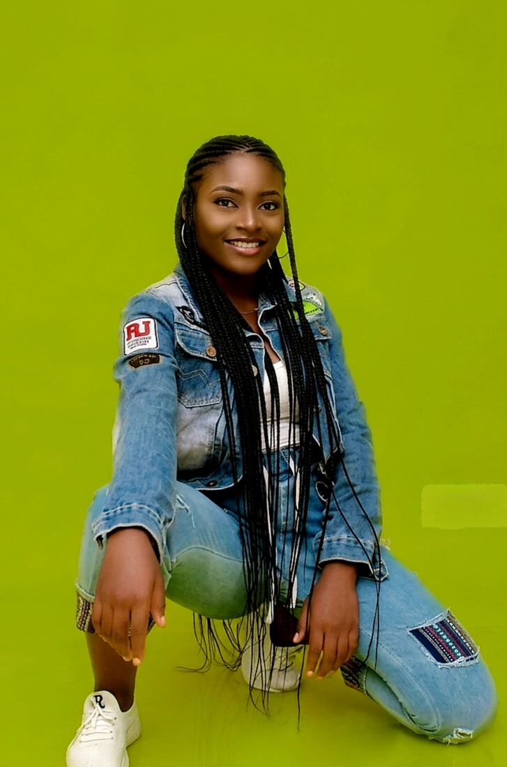 Studio portrait in denim jacket